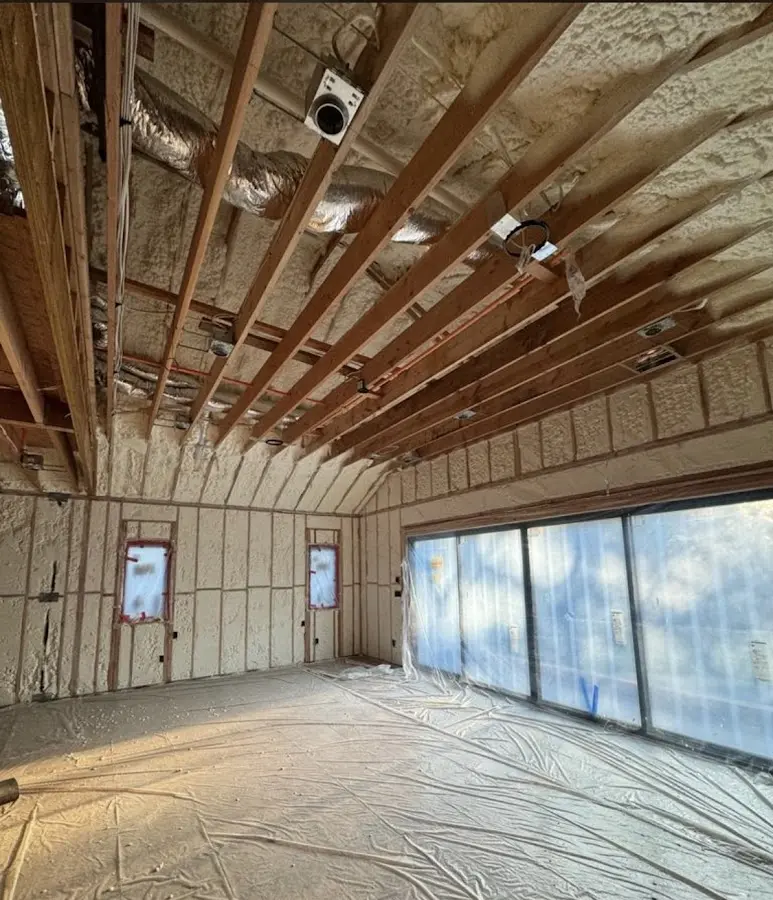 Interior walls and ceiling insulated with spray foam during new construction in Seminole